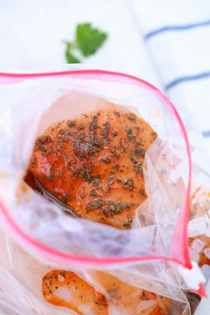 seasoned chicken breasts in freezer bag