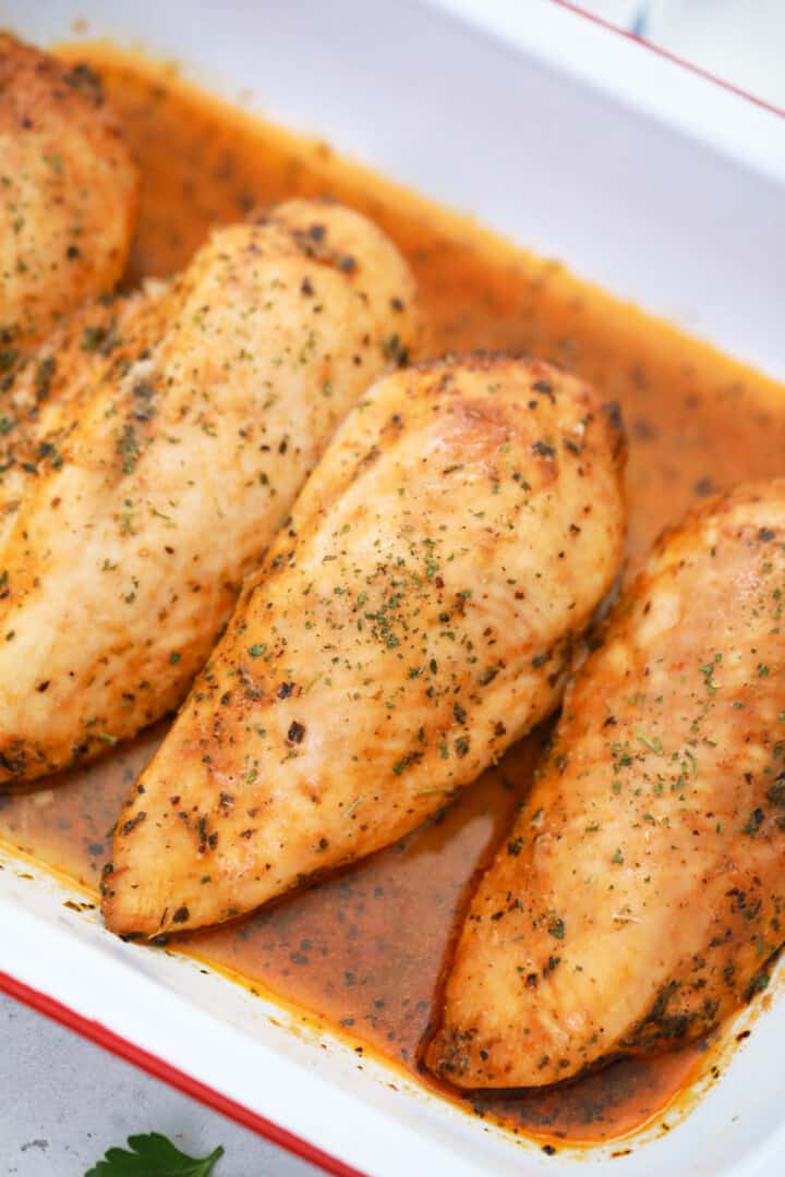 baked chicken breasts in baking dish.