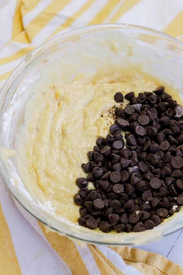 folding in the chocolate chips to the bread batter