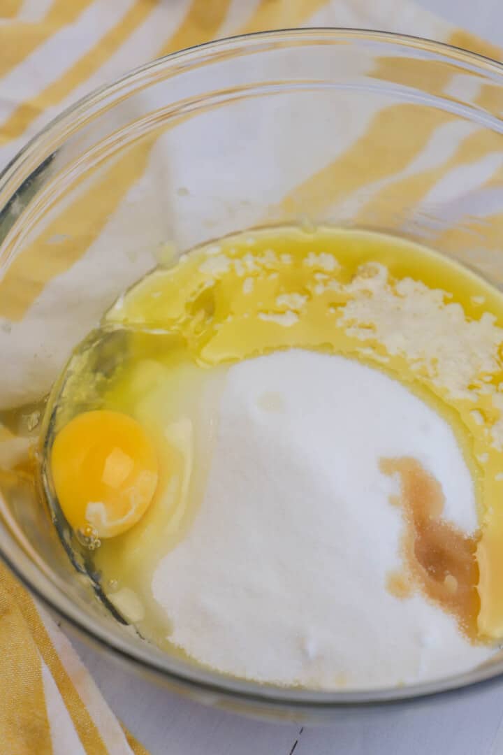 mixing together the wet ingredients for banana bread