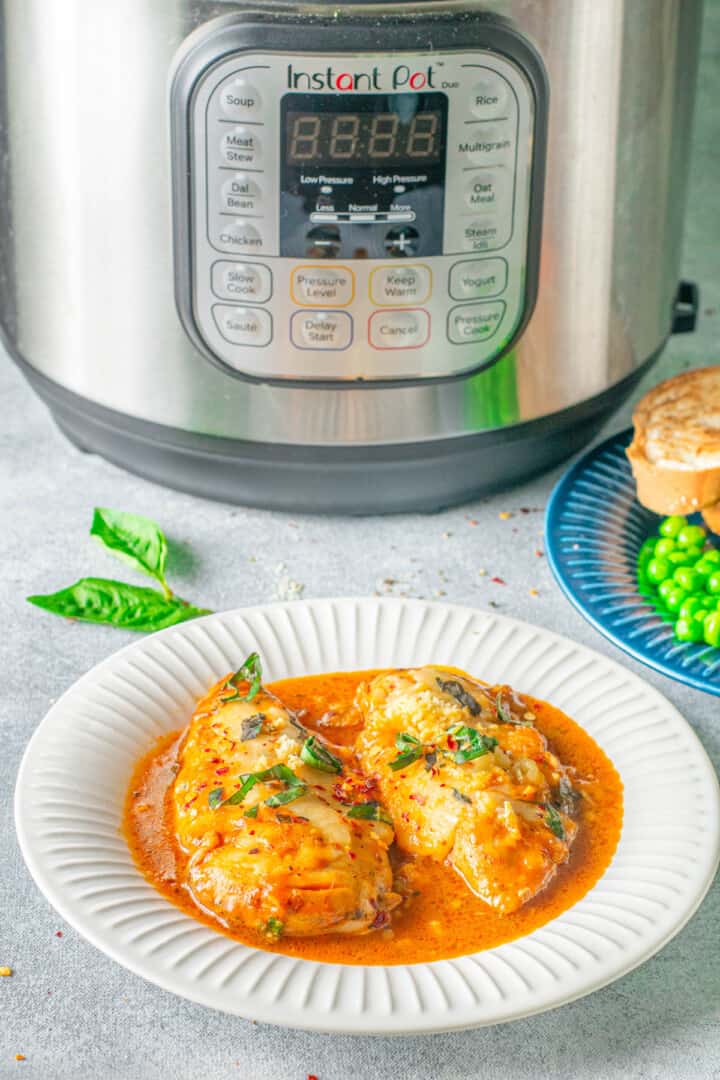 Instant Pot Chicken Parmesan with instant pot in the background