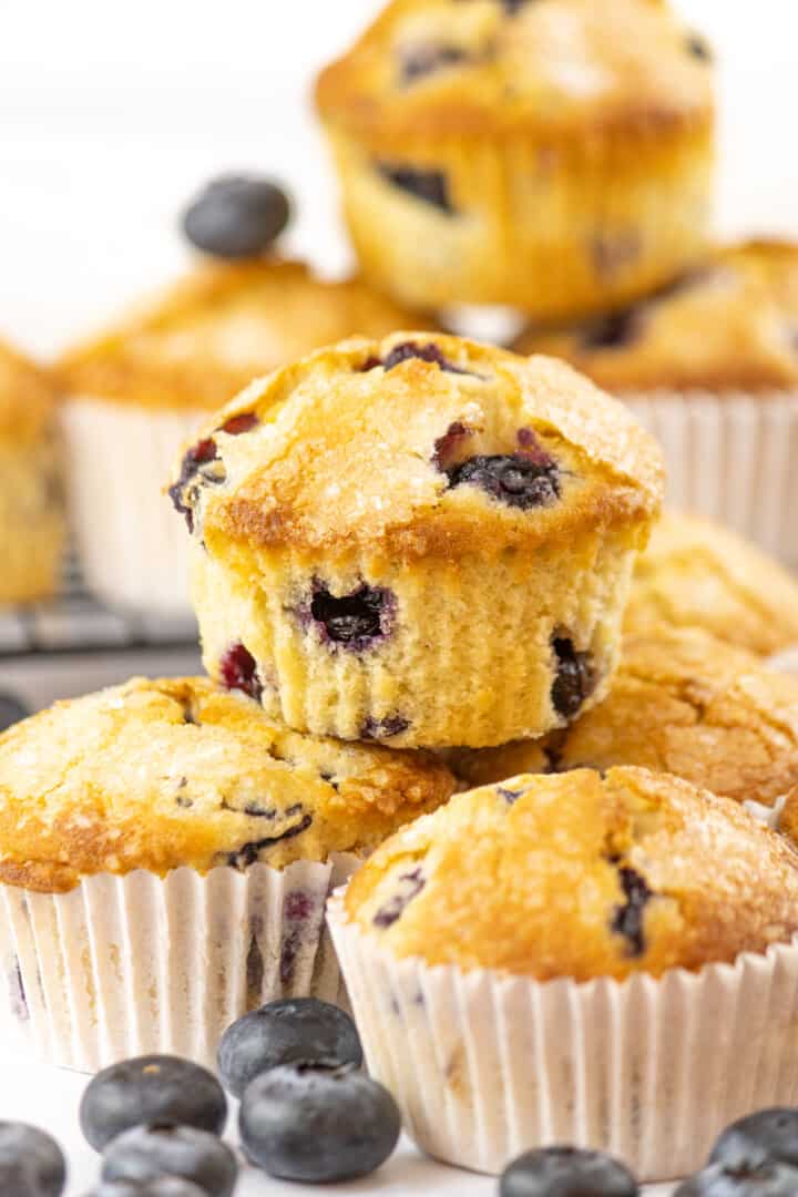 lemon blueberry muffins stacked and bunched up