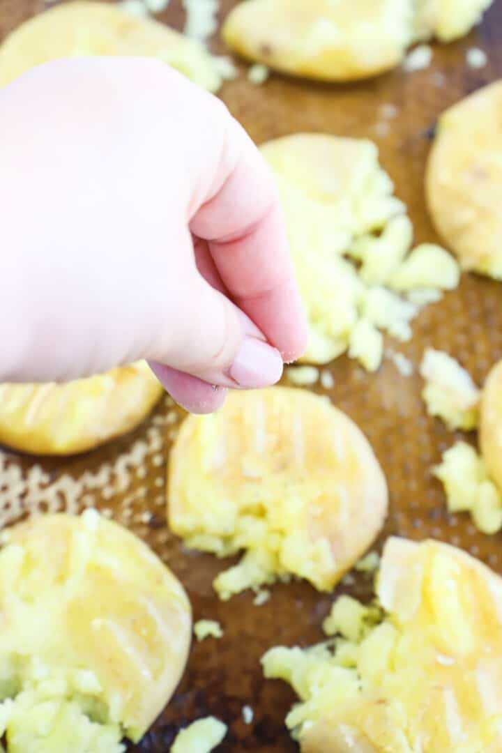 seasoning the smashed potatoes