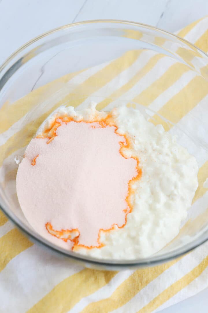 mixing the cottage cheese and Jell-o powder