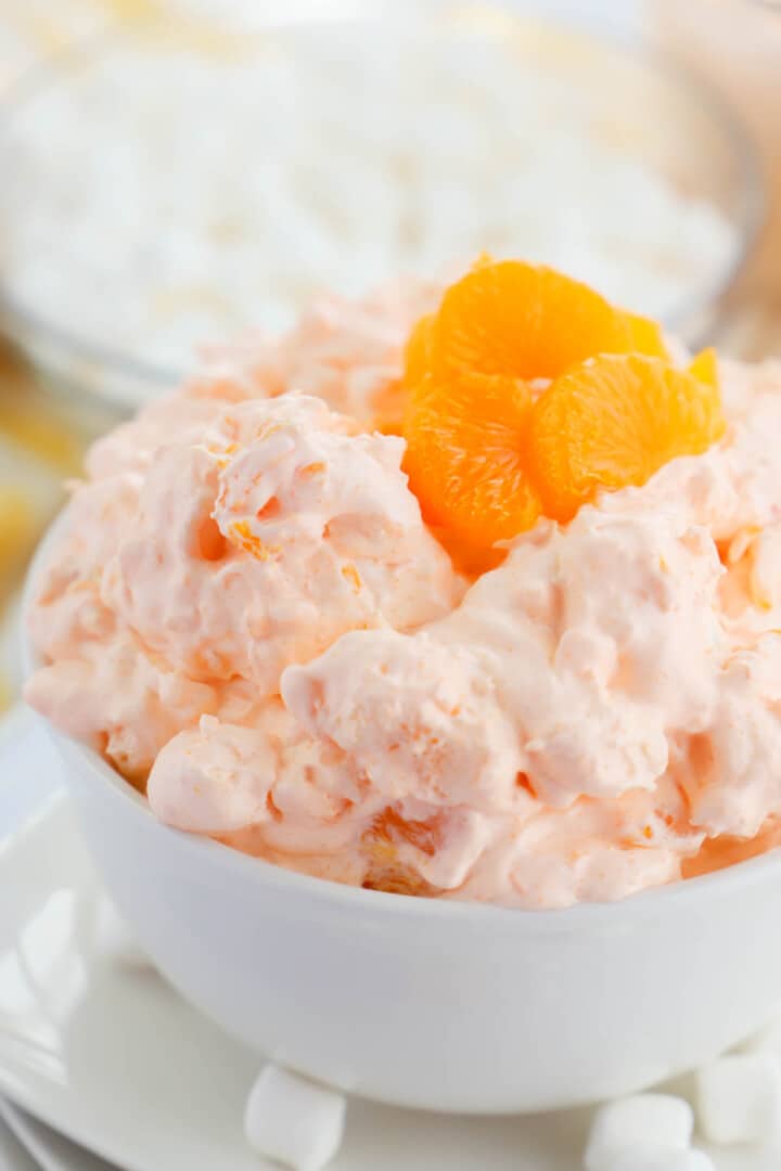 close up of orange fluff in white bowl