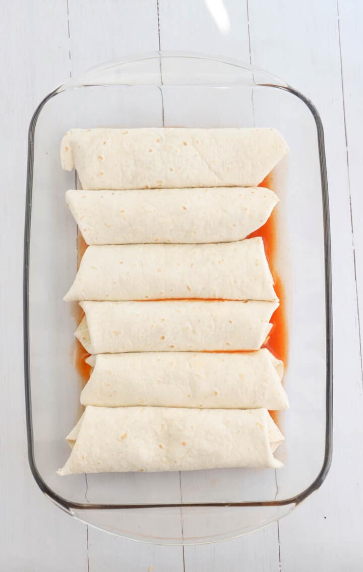 enchiladas folded in casserole dish