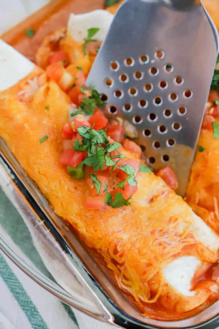 serving enchiladas out of the casserole dish