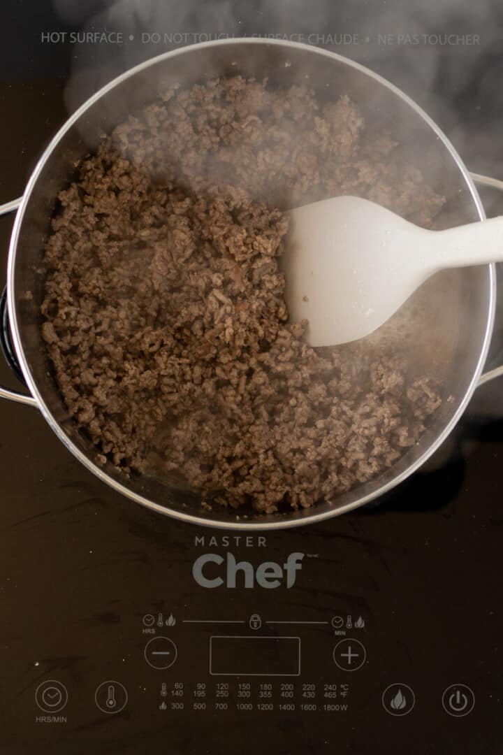 cooking ground beef in large soup pot