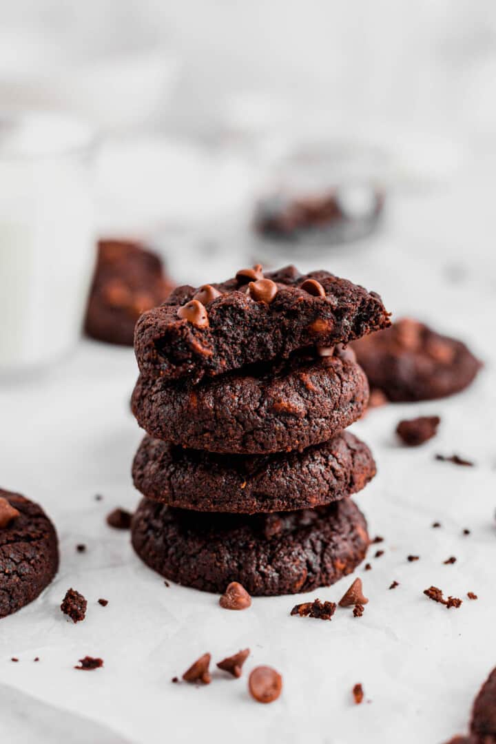 Double Chocolate Chip Cookies stacked on counter