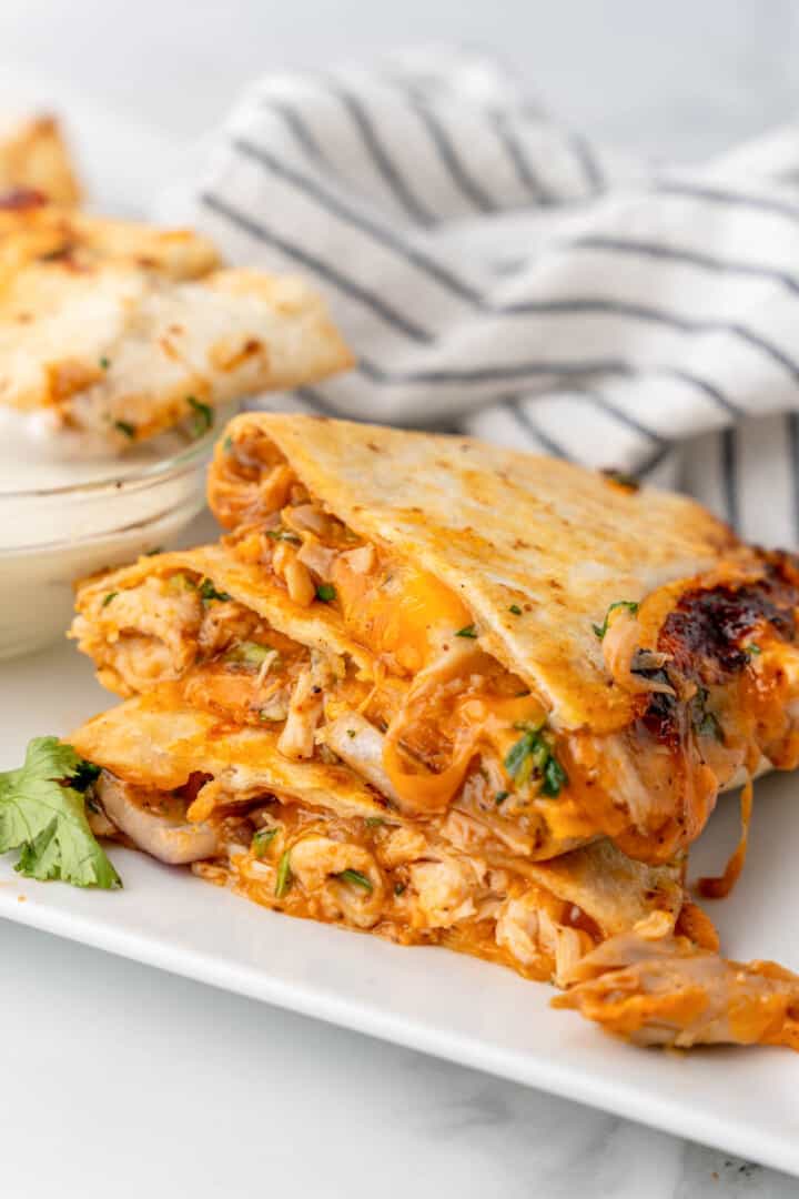BBQ Chicken Quesadilla stacked on white plate