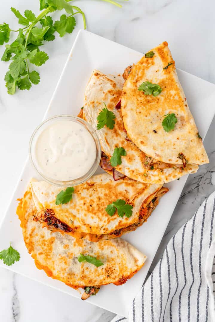 serving quesadillas with ranch dressing