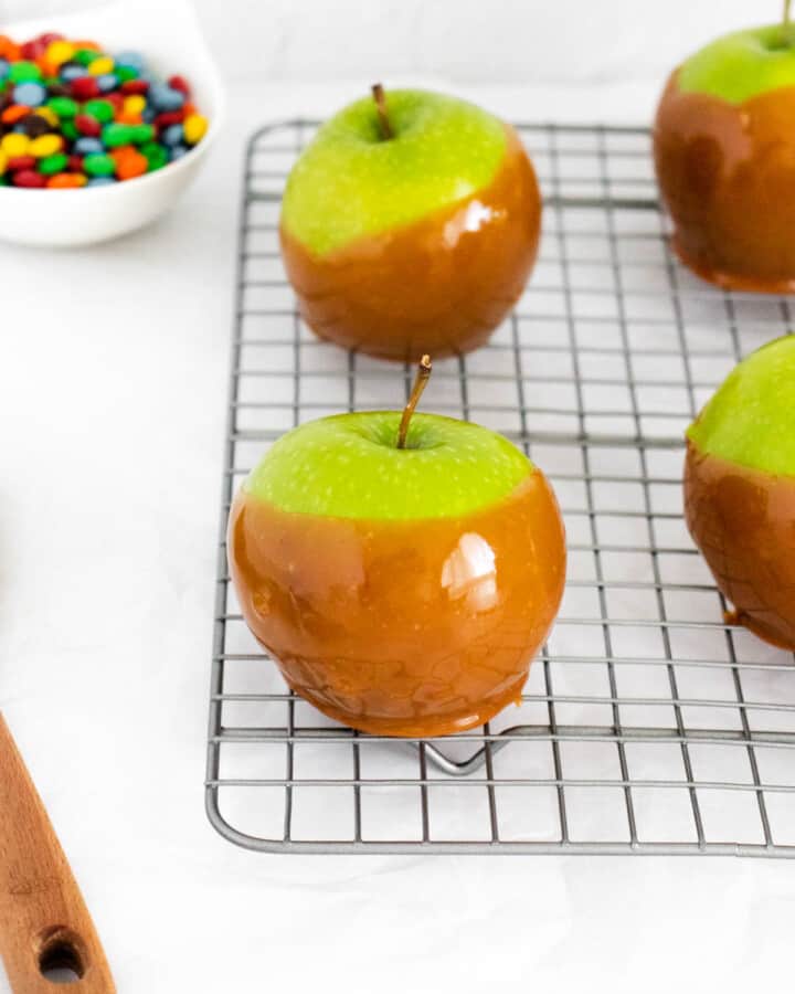 Caramel Apples on wire rack.