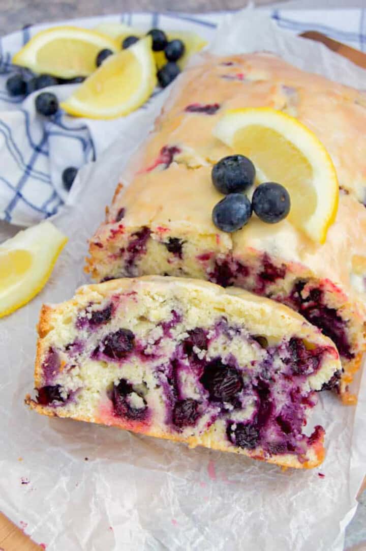 Blueberry Lemon Load sliced on parchment paper.