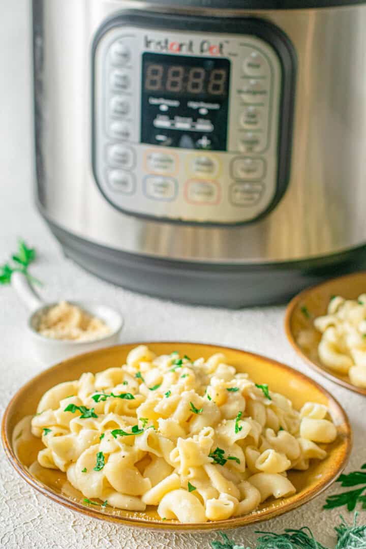 instant pot mac and cheese in yellow bowl.