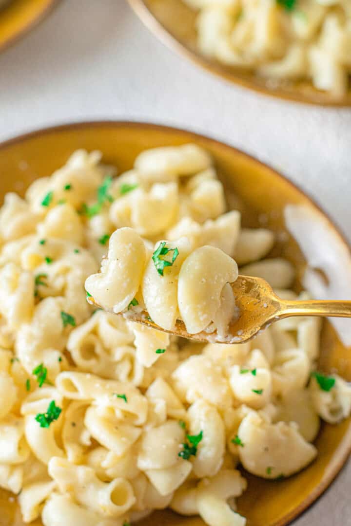closeup of instant pot mac and cheese on fork.