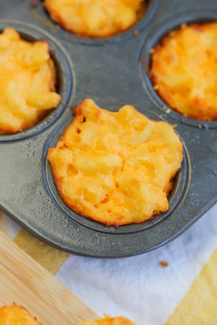 baked mac and cheese bites in mini muffin pan.