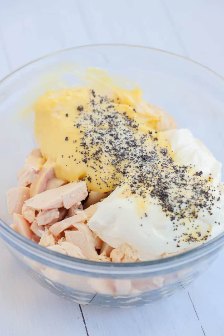 ingredients for casserole in glass mixing dish.