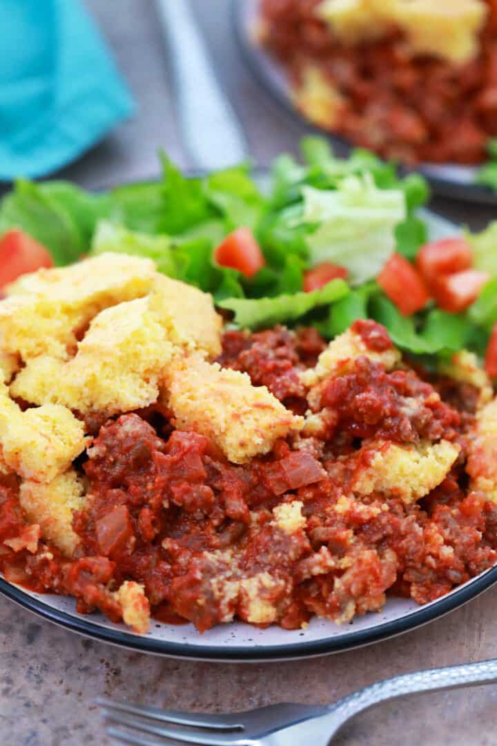 Sloppy Joe Casserole on plate with salad