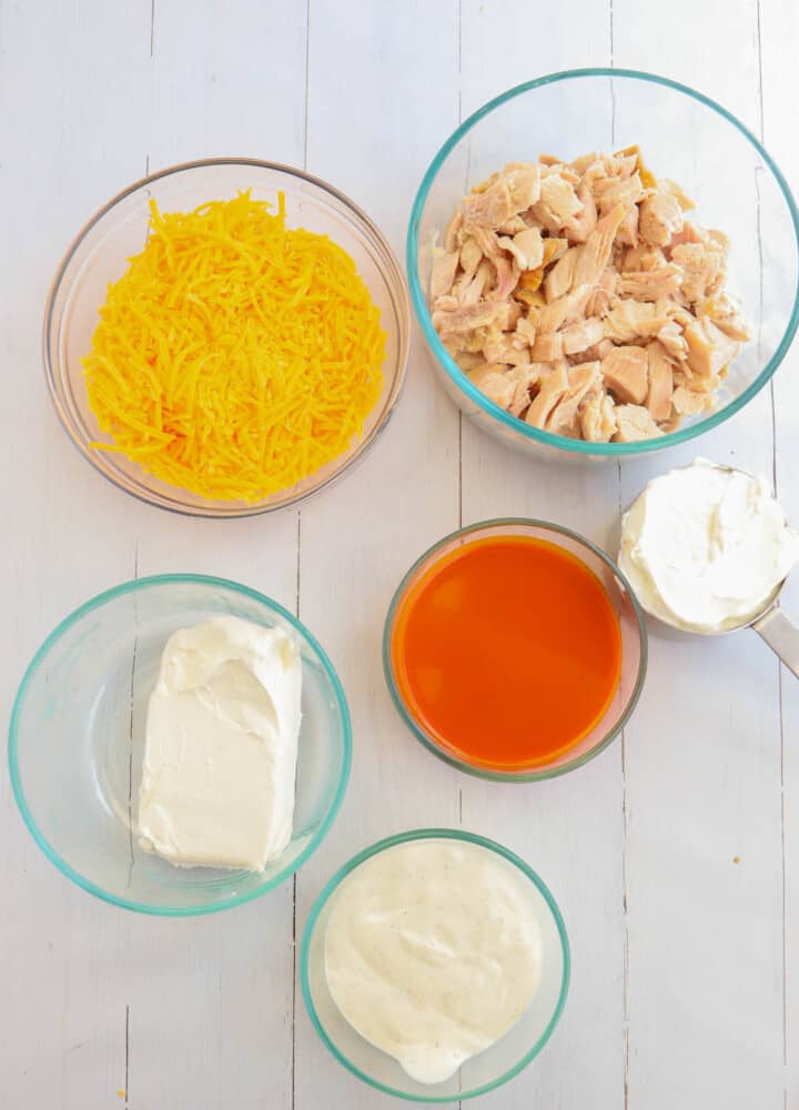 ingredients for slow cooker Buffalo chicken dip.