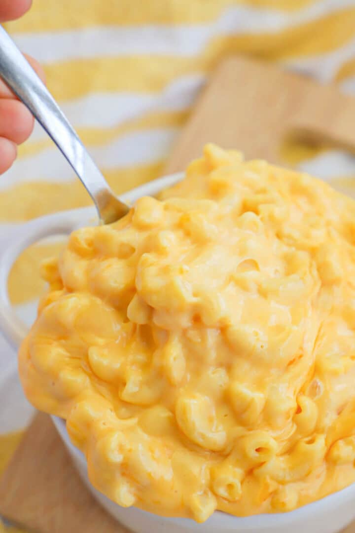 closeup of Velveeta mac and cheese on spoon.