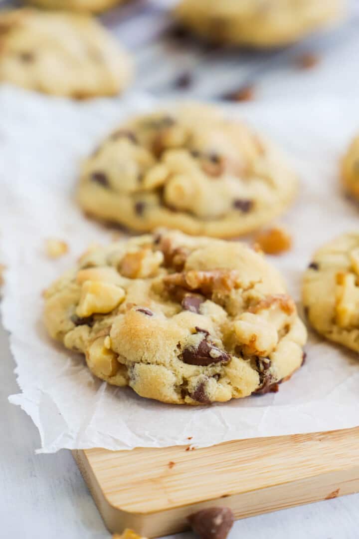 Walnut Chocolate Chip Cookies on wooden board.