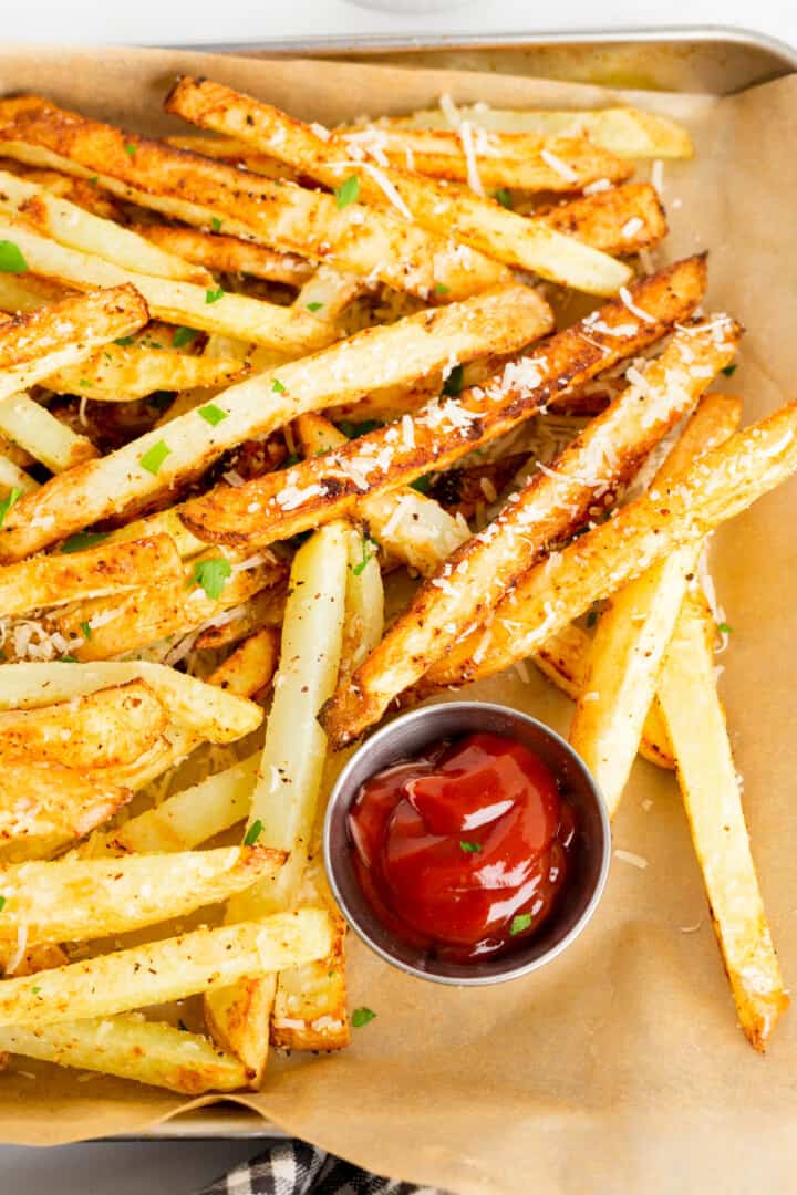 top down view of French Fries on serving tray.