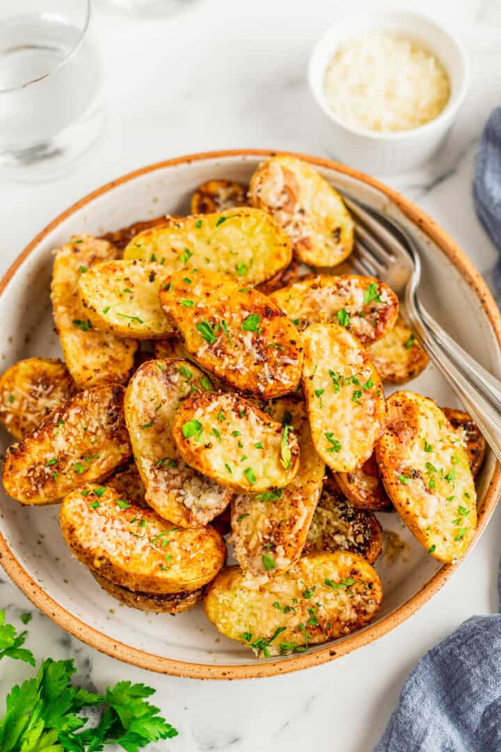 air fryer roasted potatoes on serving plate.