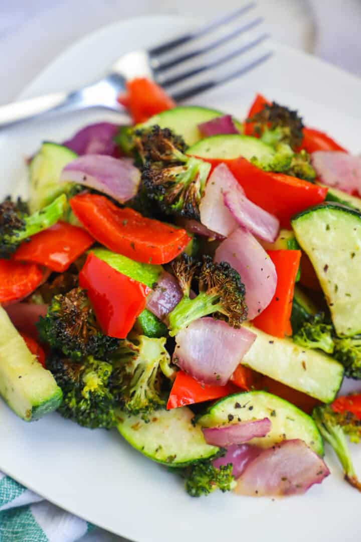Air Fryer Vegetables on white plate.