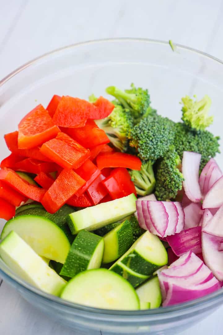 diced veggies in glass bowl.