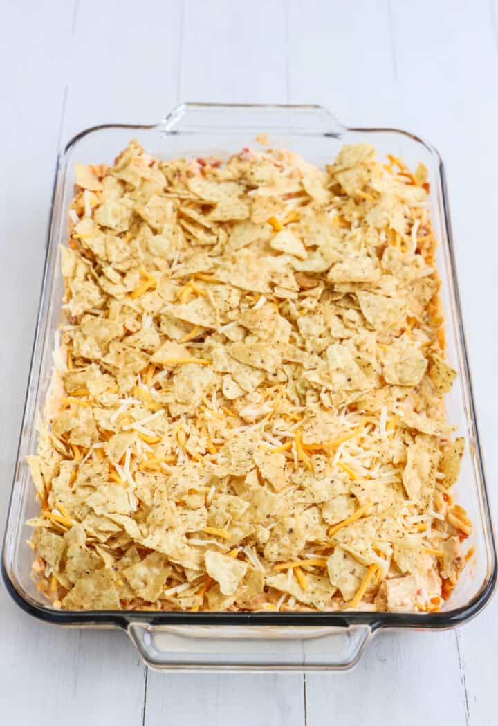 Mexican chicken casserole in baking dish before baking.