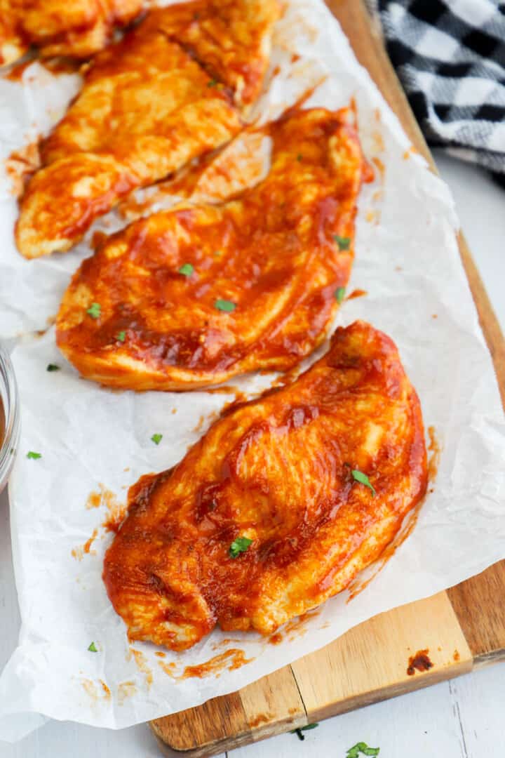 Air Fryer BBQ Chicken on wooden serving board.