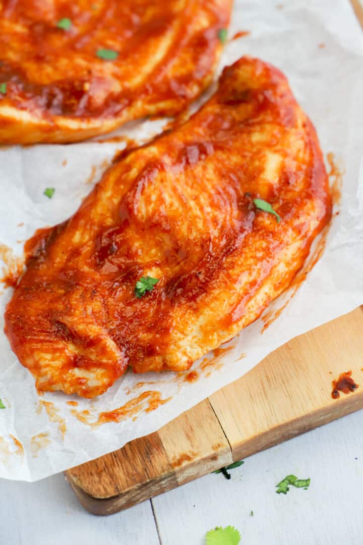 closeup of air fryer BBQ chicken breasts.