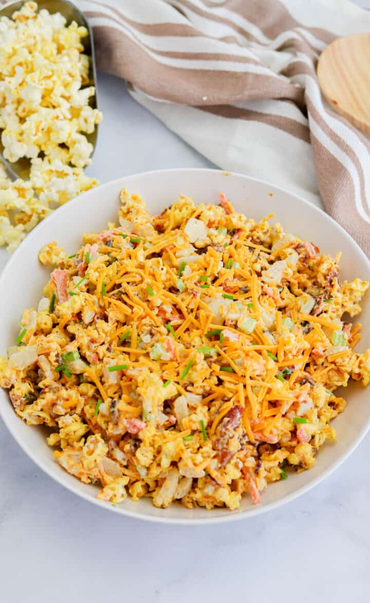 popcorn salad in white serving bowl.