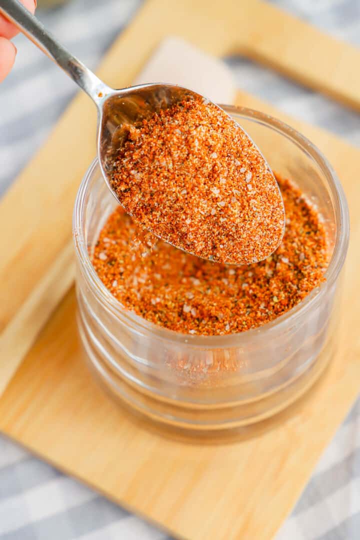 Steak Rub in small mason jar on spoon.