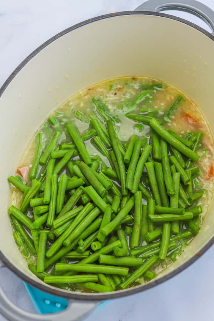 adding all remaining ingredients to the large pot for the green beans.