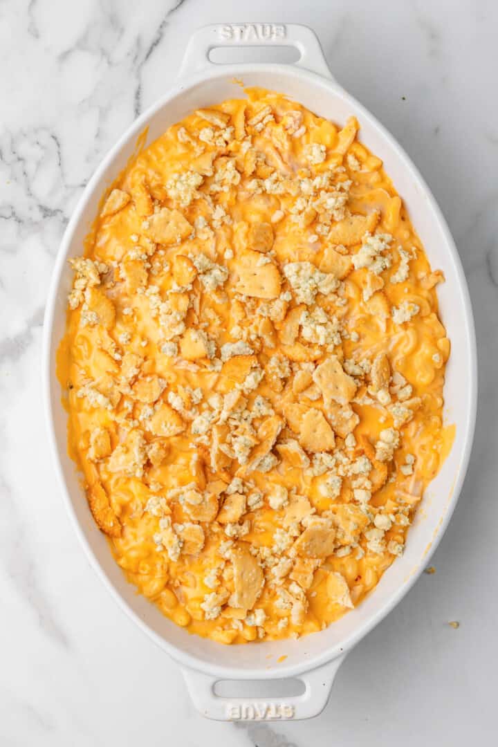 Buffalo Chicken Mac and Cheese in casserole dish with Ritz cracker topping.