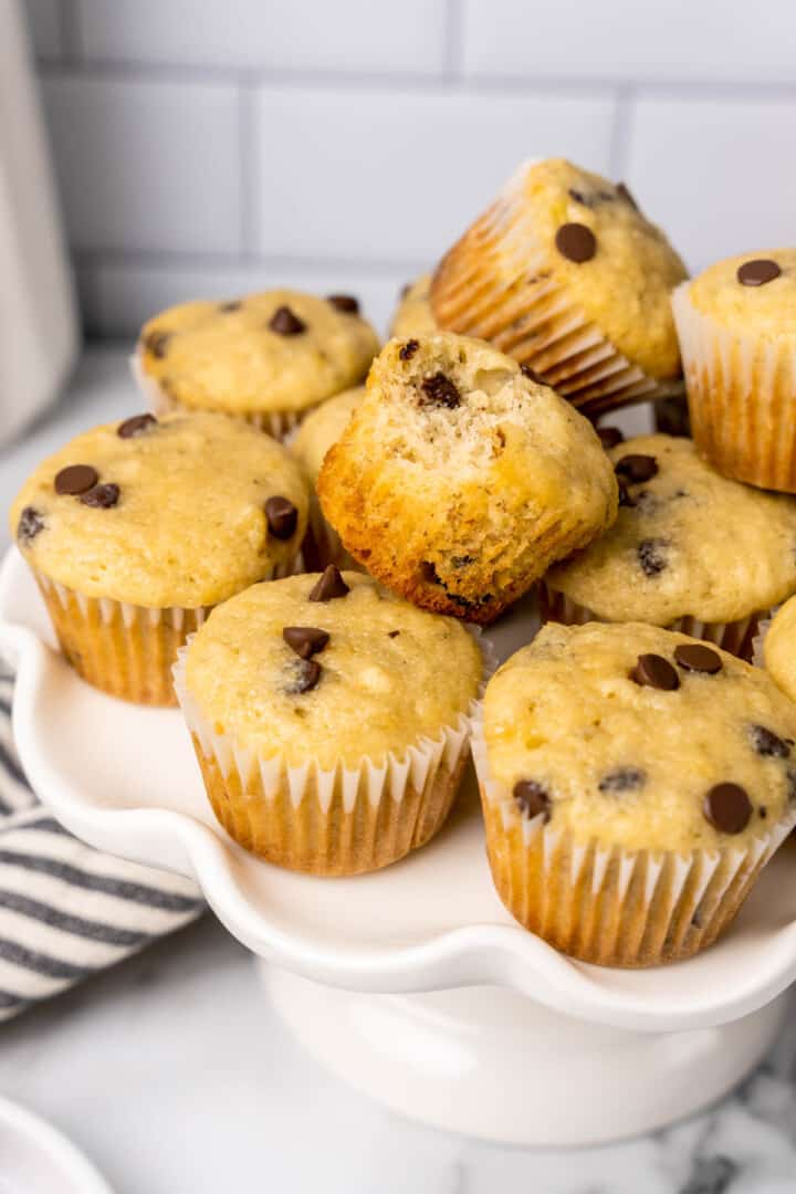 closeup of mini banana chocolate chip muffins on stand.