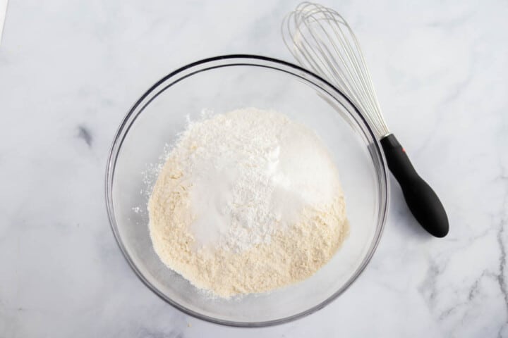 mixing the dry ingredients for the biscuits.