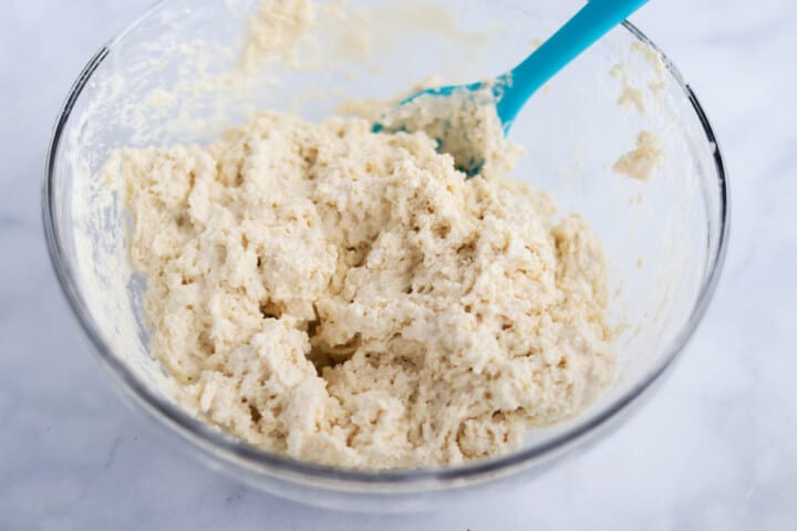 mixing the batter for the butter swim biscuits.