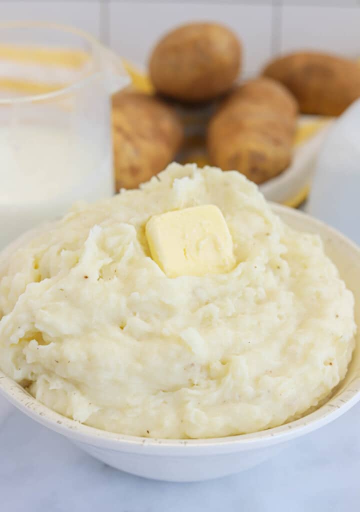Buttermilk Mashed Potatoes in white serving bowl.