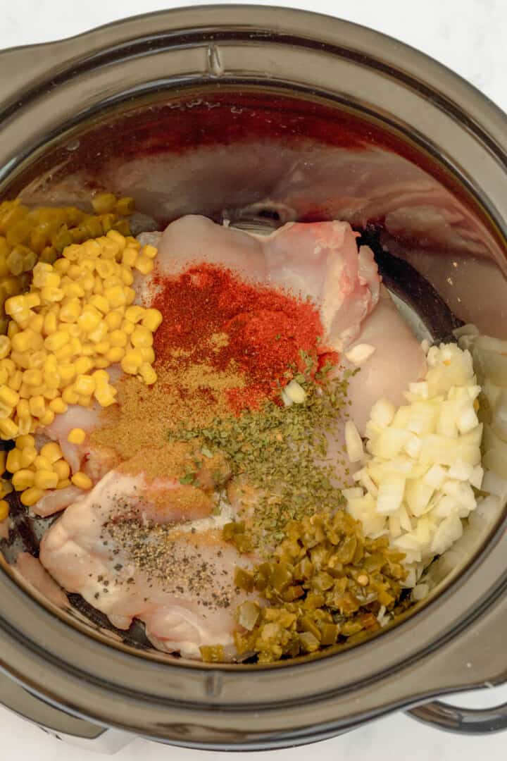 all ingredients in the slow cooker for the chili.
