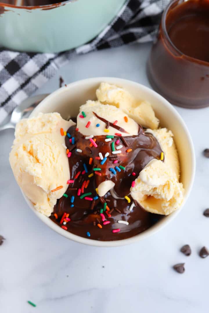 hot fudge over top of vanilla ice cream.