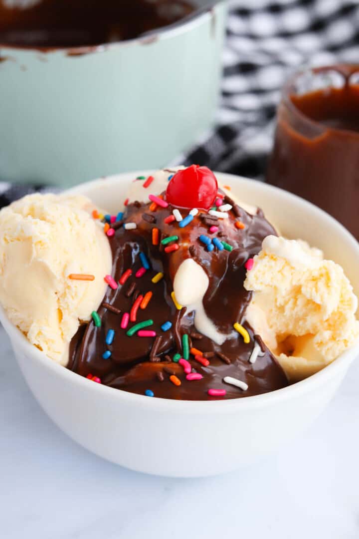 closeup of hot fudge on ice cream.