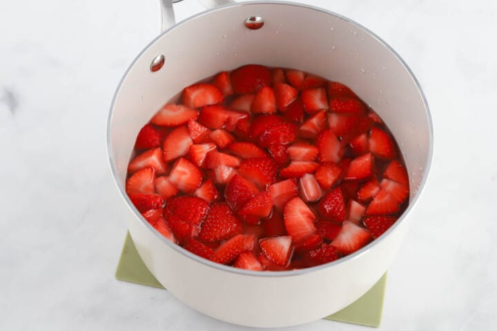 strawberries heated in saucepan.
