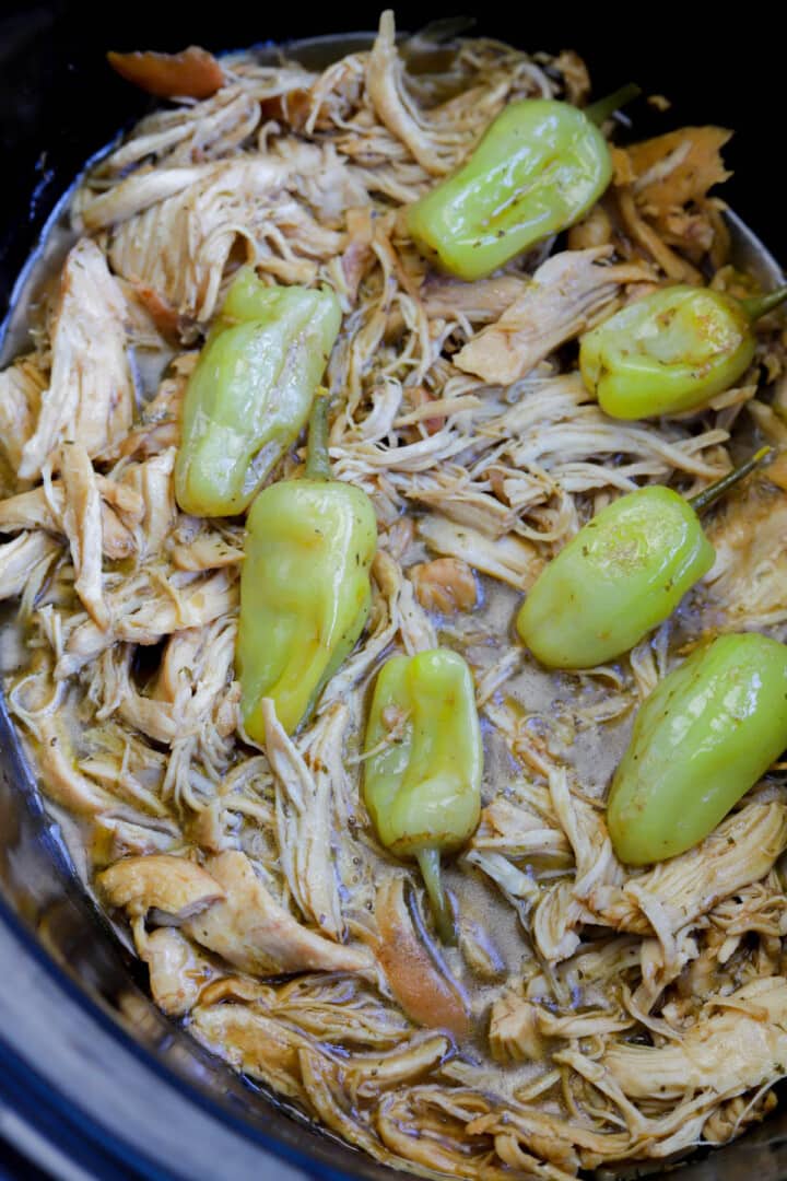 Mississippi Chicken in the slow cooker with pepperoncini. 