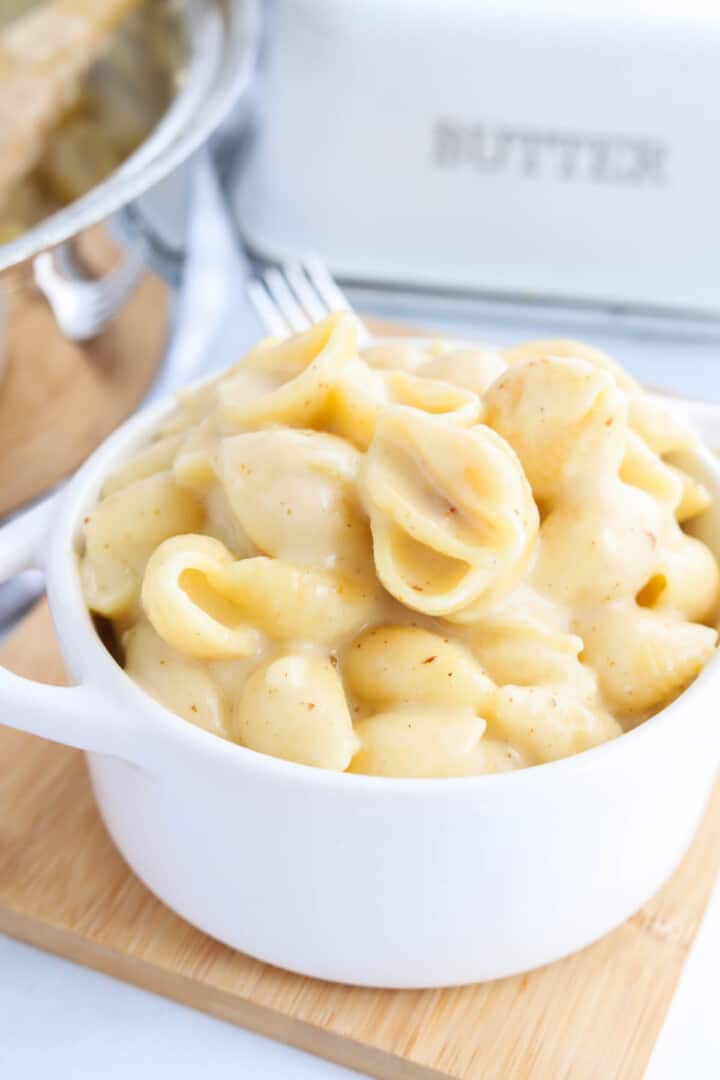 White Cheddar Mac and Cheese in white serving bowl.