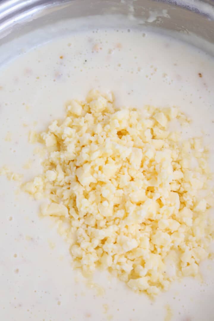 making the cheese sauce for the mac and cheese.