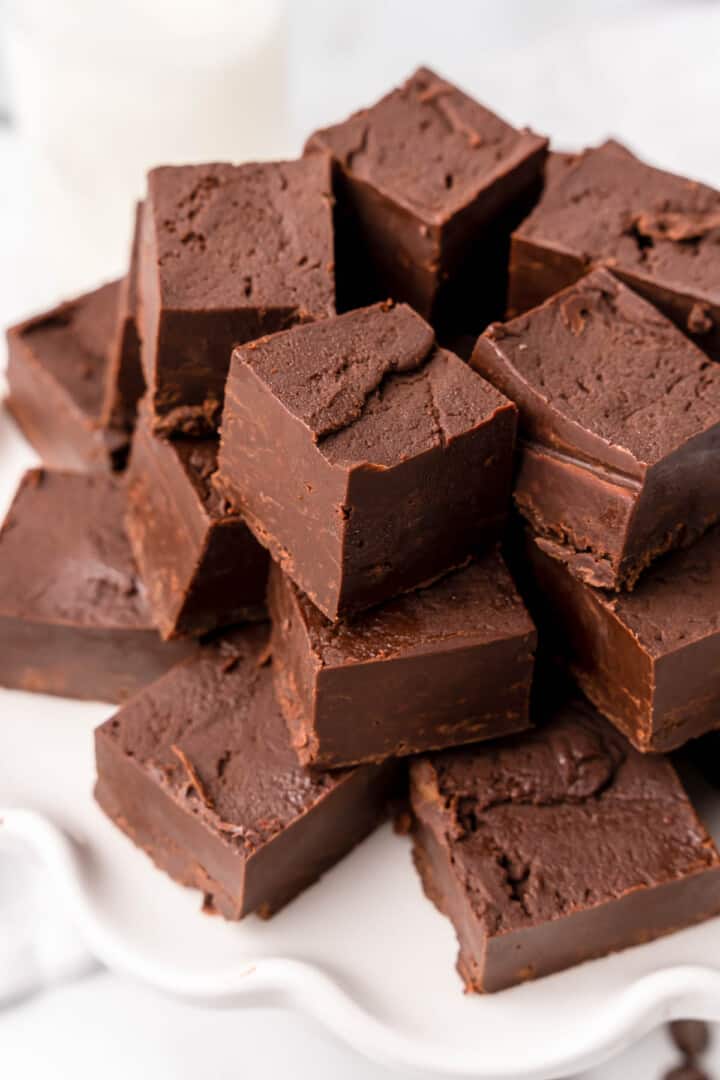 Microwave Fudge stacked on a serving plate.