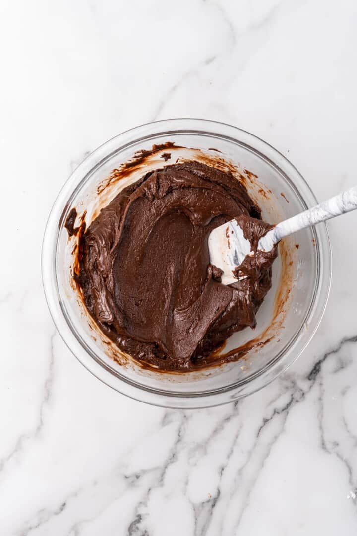 mixing the ingredients for the fudge together.