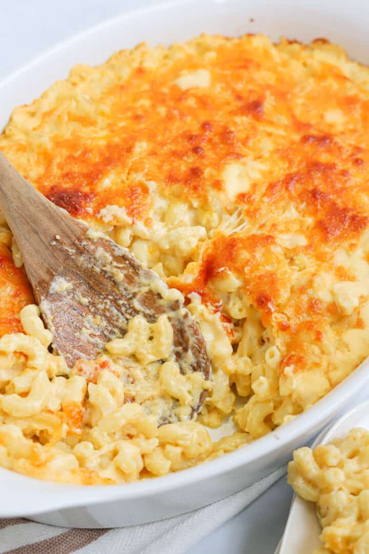 four cheese mac and cheese in white baking dish.